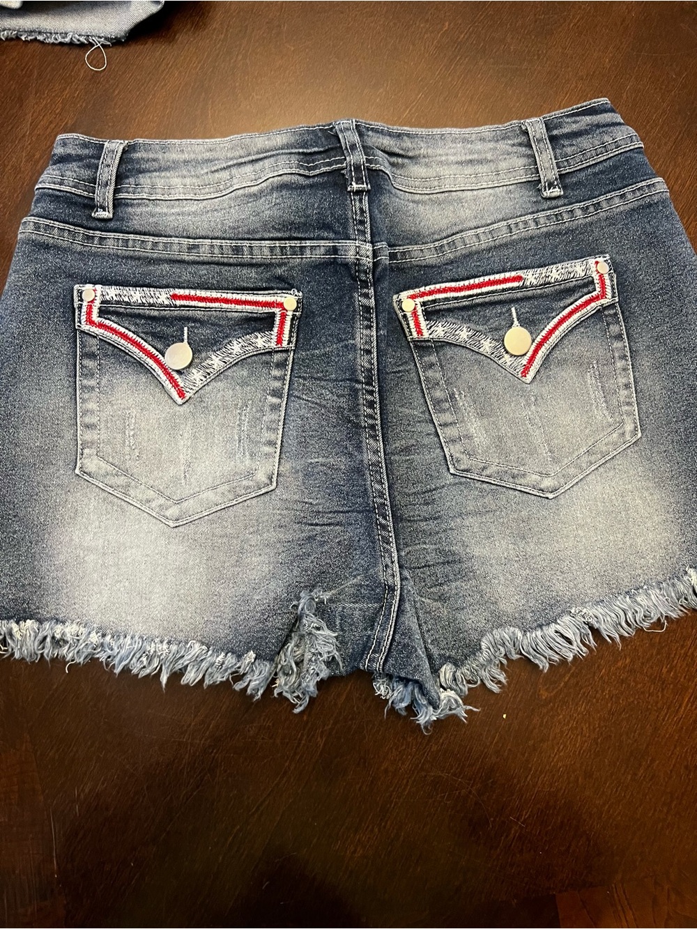 Denim Frayed Hem Women's Shorts - Faded Blue Red, White, Blue pockets